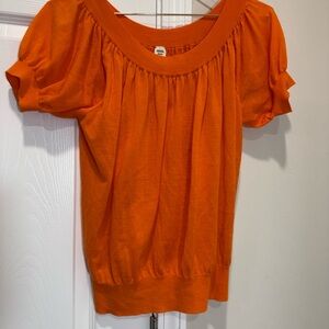 Hermès
Cashmere vest in bold orange Sz 38